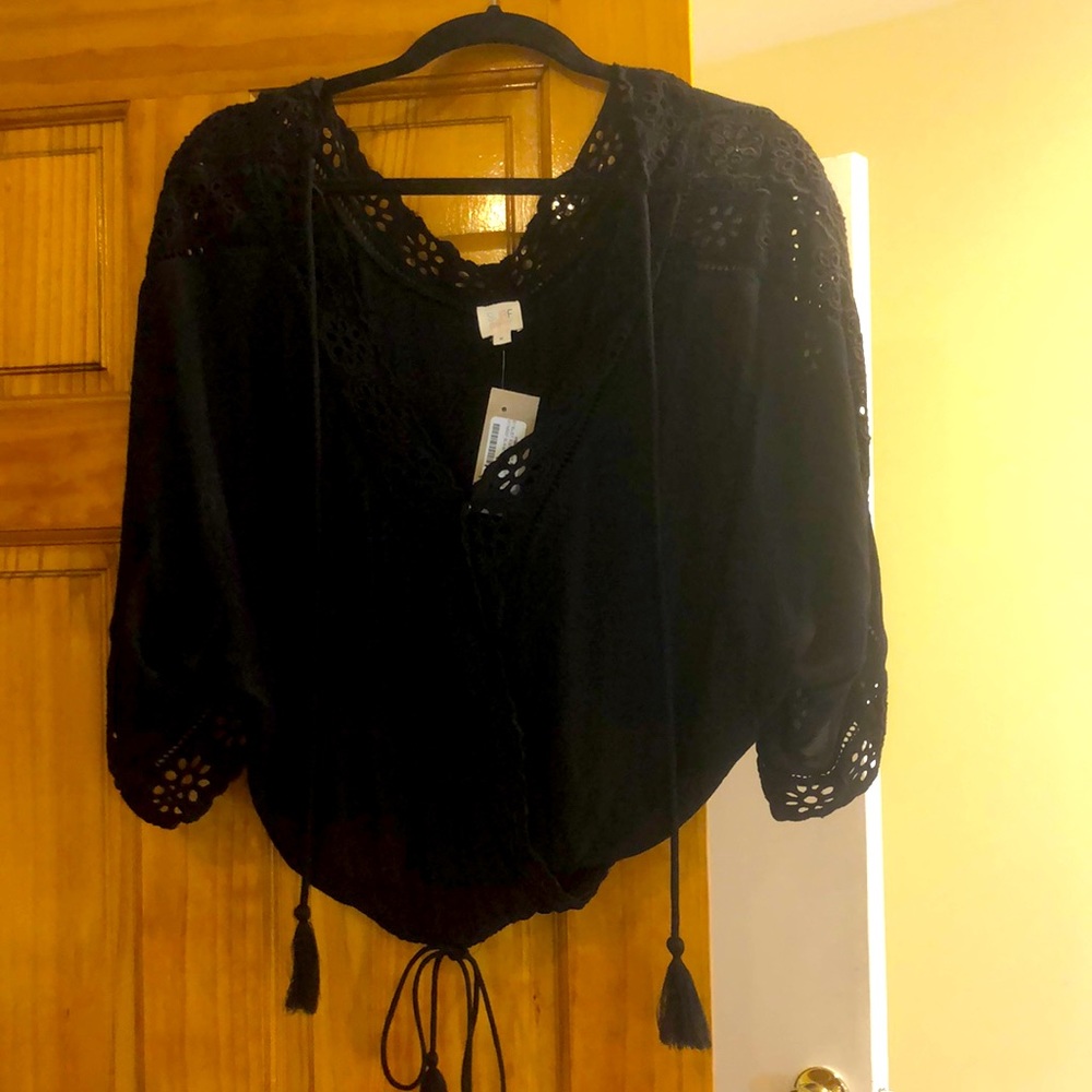 Surf Gypsy boho top, BNWT, size medium in black. Beautiful cut-out details.